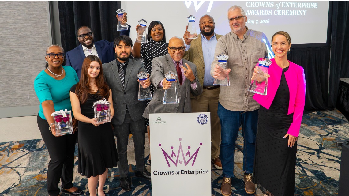Several people holding awards at the 15th annual Crowns of Enterprise ceremony